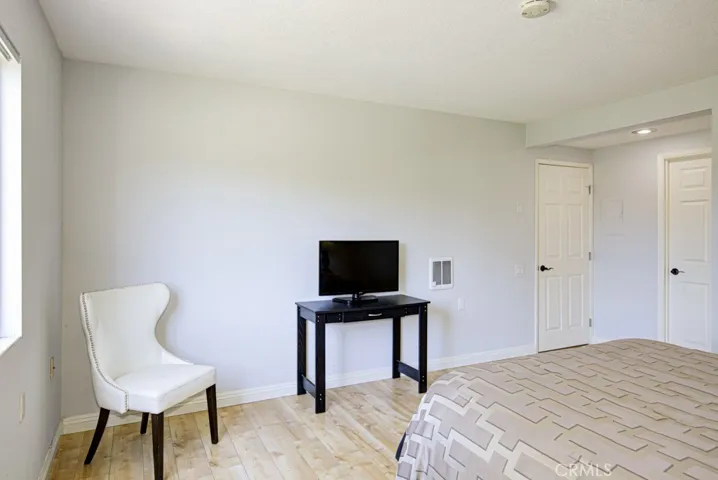 Primary Suite looking toward hall and walk in closet.