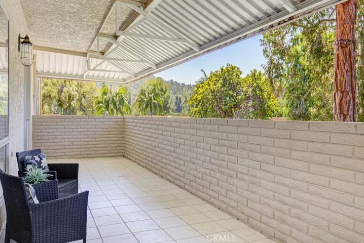 Ground floor entry.  Take the sidewalk or the stairs to the carport.