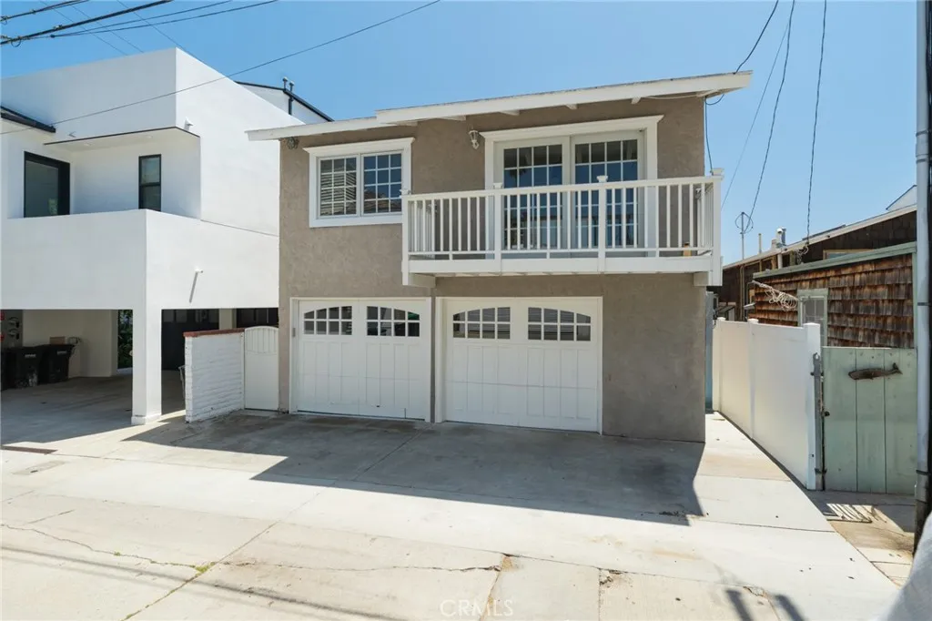 Rear View of property. Stairs are on the left side