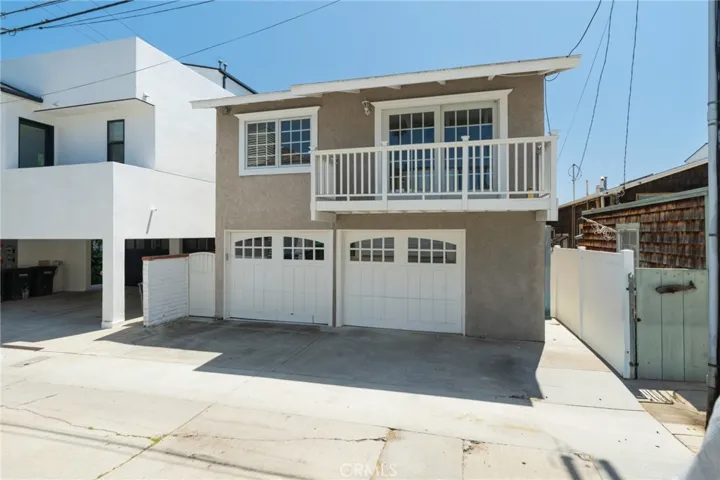 Rear View of property. Stairs are on the left side