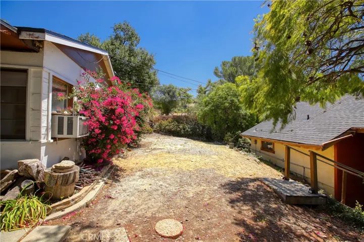 Parking area in between main house and guest unit