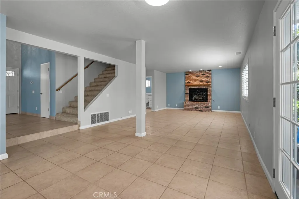 Family Room With Wood-Burning Fireplace