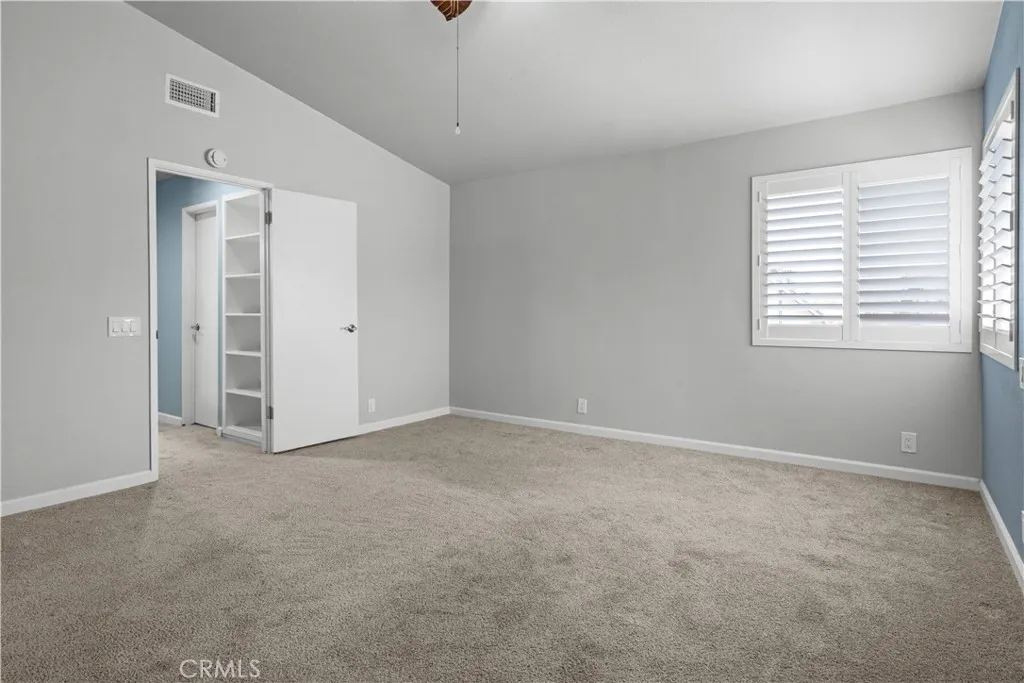 Primary Bedroom With Cathedral Ceiling