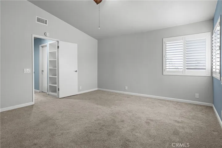 Primary Bedroom With Cathedral Ceiling
