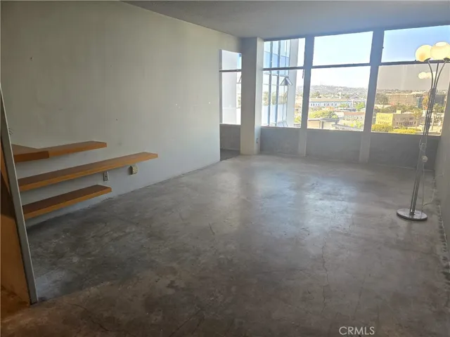 This studio space is ready for your touch. Wall could be opened,kitchen reconfigured, making a cool modern space. Some have even worked in a private sleeping area