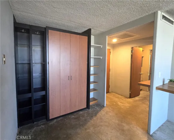 Twin size Murphy bed with built-in shelving
