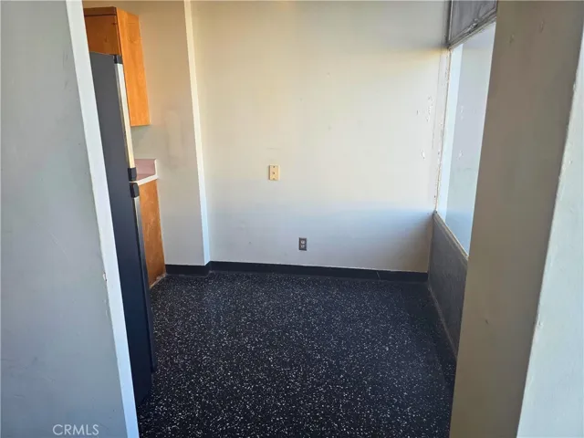 Technically the in-kitchen dining area, but kitchen could be reconfigured to use this space
