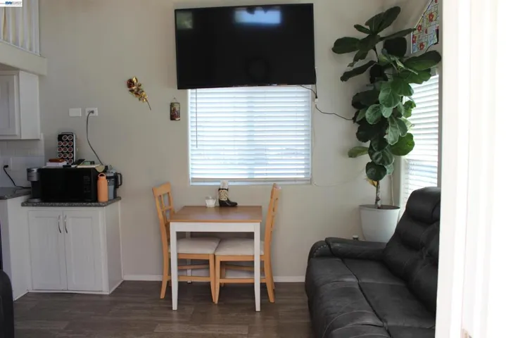 You can see the living room and dining area.