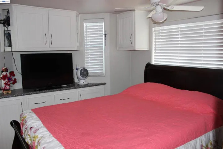 Bedroom with builtin cabinets