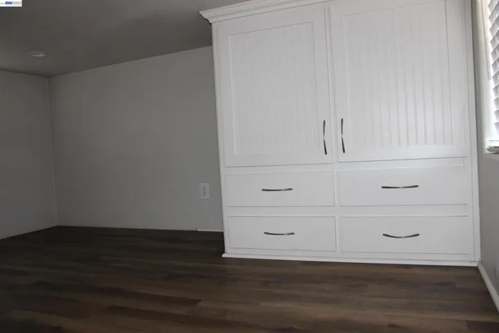 Left side of second floor of storage area.  Built in cabinet.