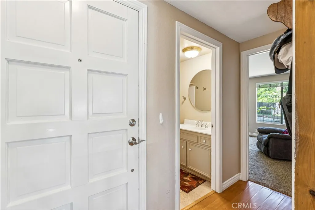 Main level hall to bathroom & bedroom