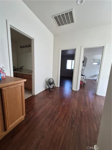 Landing upstairs with built in Cabinets. Area is large enough to put a desk or shelves.
