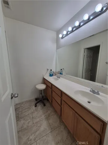 Restroom #2 upstairs with Double Sinks.