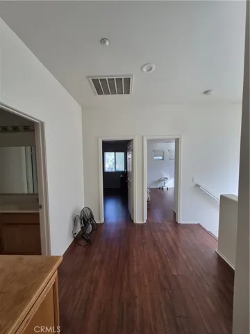 Landing upstairs with built in Shelves.
