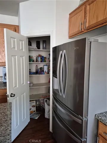 Pantry and Stainless steel Refrigerator.