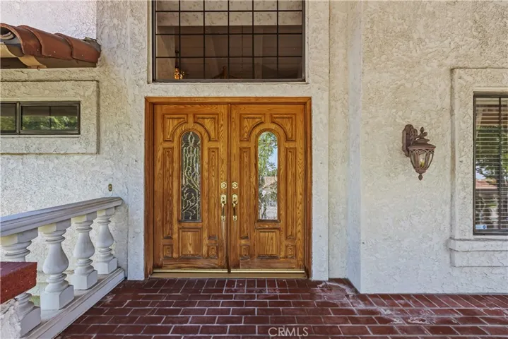 Large Front porch and Double Door Entry.