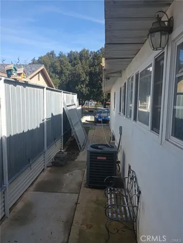 Side house entry to studio