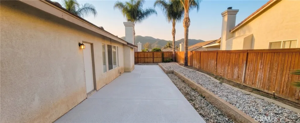 Side Yard with full swing gate access for your toys.