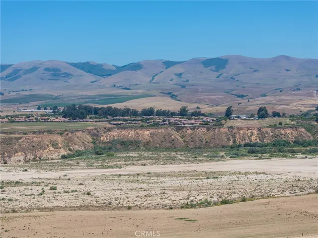 Aerial View Of Sant Maria River With Mountains In Background