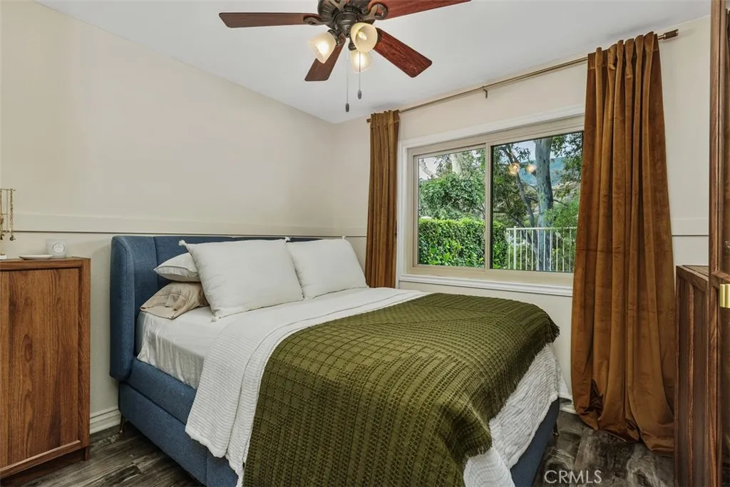 Secondary Bedroom  with View of the Hills , Ceiling Fans and Vinyl Plank Flooring
