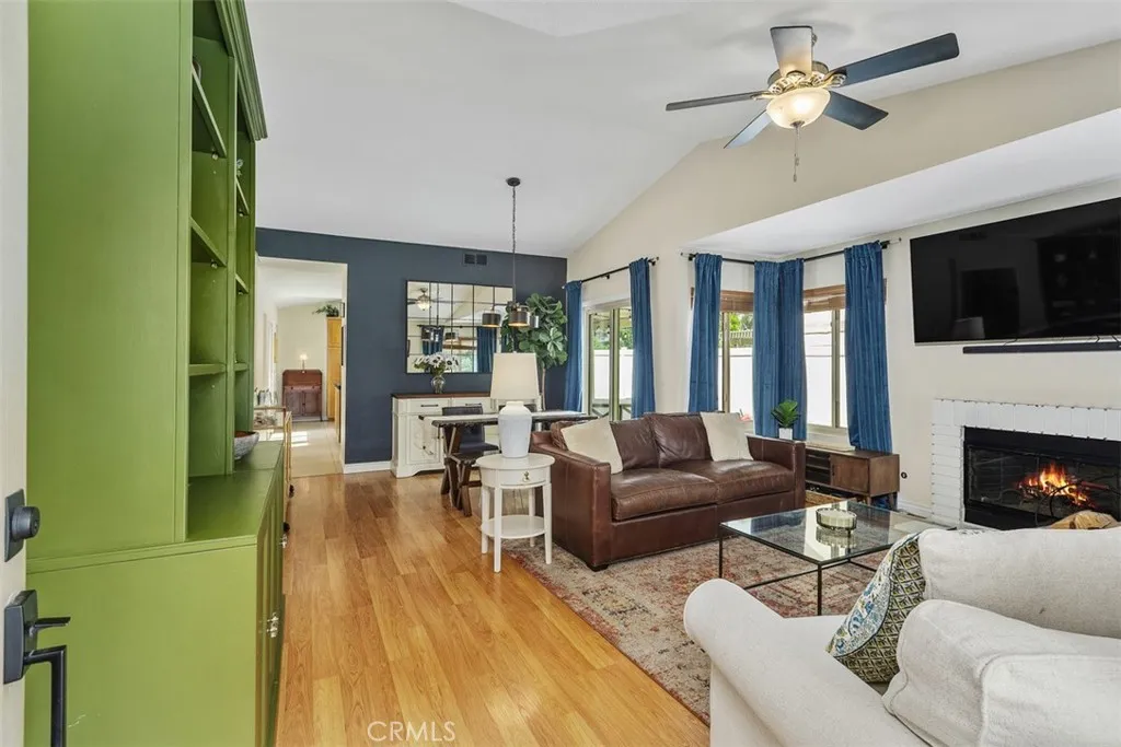 Living Room with Fireplace Ceiling Fan
