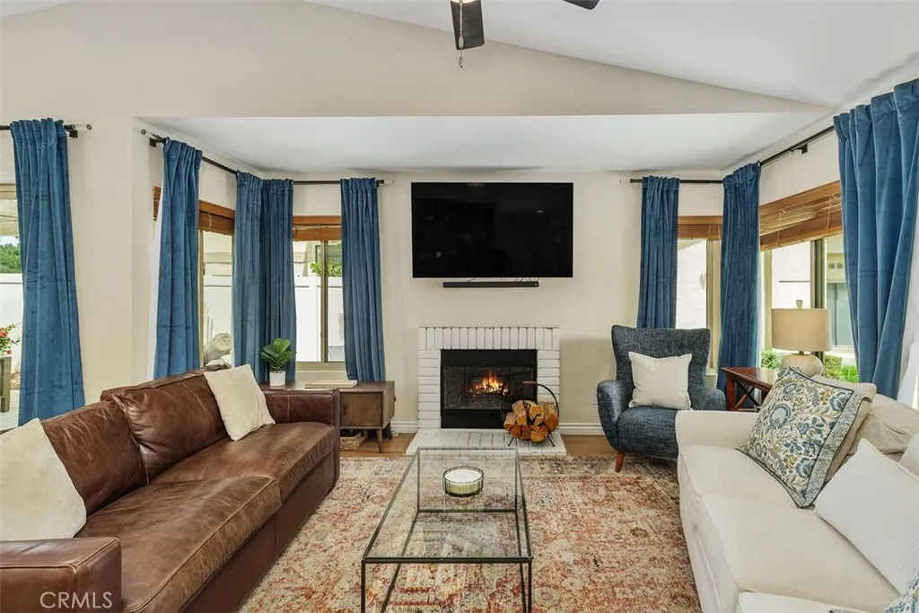 Living Room with Lots of Windows and Raised Ceiling