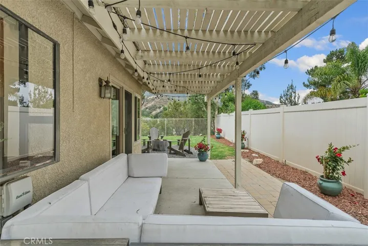 Side Patio Area with Patio Cover and Vinyl Fencing