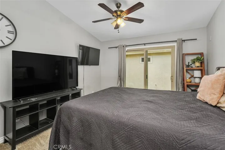 Primary Bedroom w/Ceiling Fan and Direct Access to Atrium