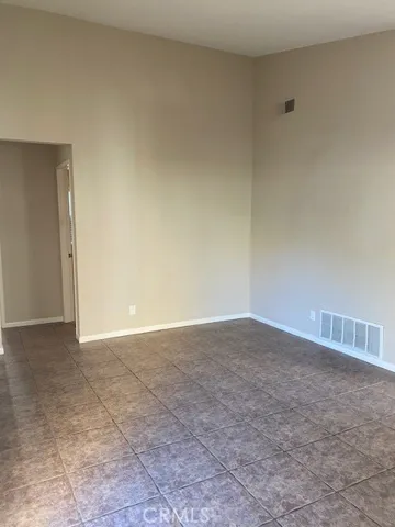 Living Room toward hall leading to three beds and two baths