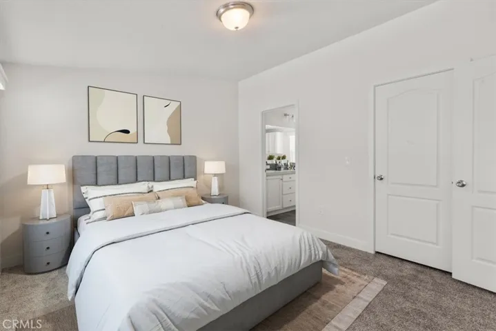 Master Bedroom with bath/hall access. virtually staged