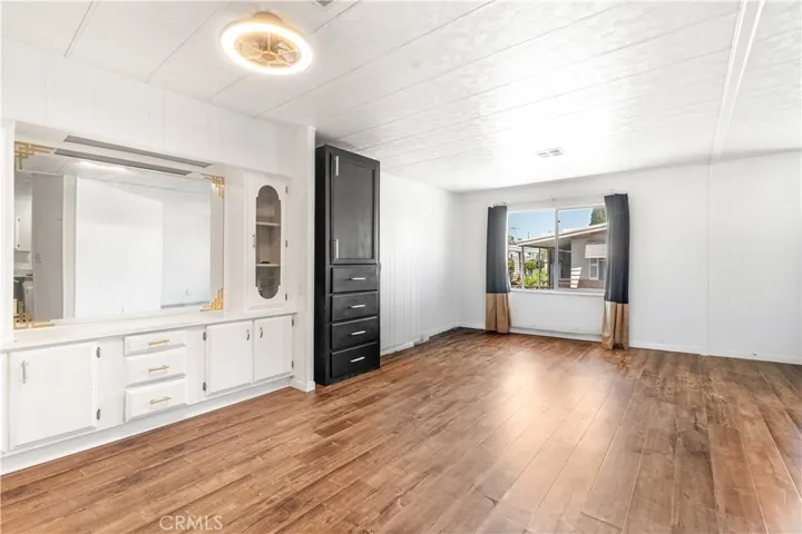 Dining area and partial living room