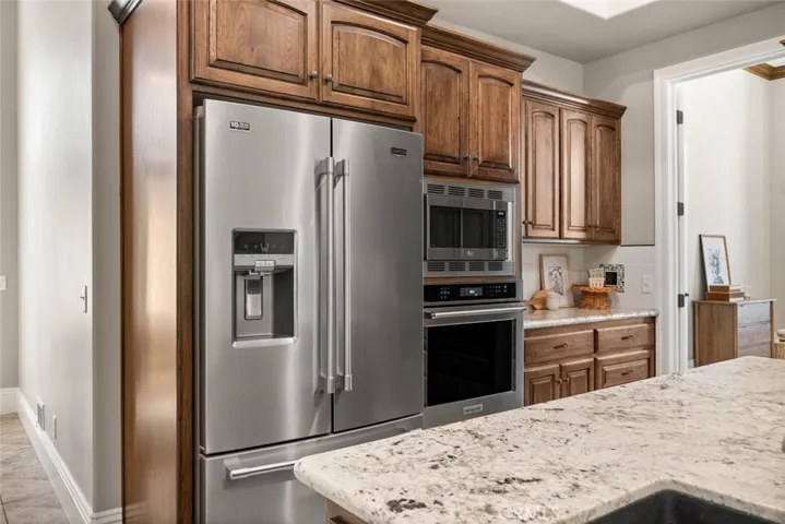 Refrigerator, microwave, one of two ovens