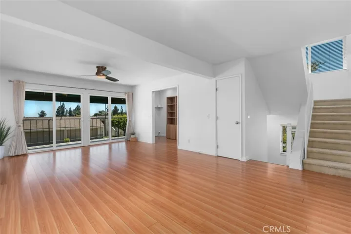 LIVING ROOM - OFFICE - WALK-IN CLOSET - STAIRS THAT LEAD TO THE BEDROOMS