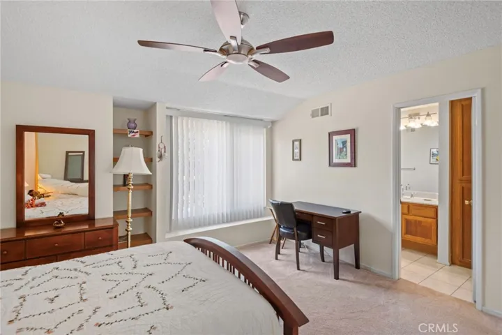 Primary bedroom with its own bathroom