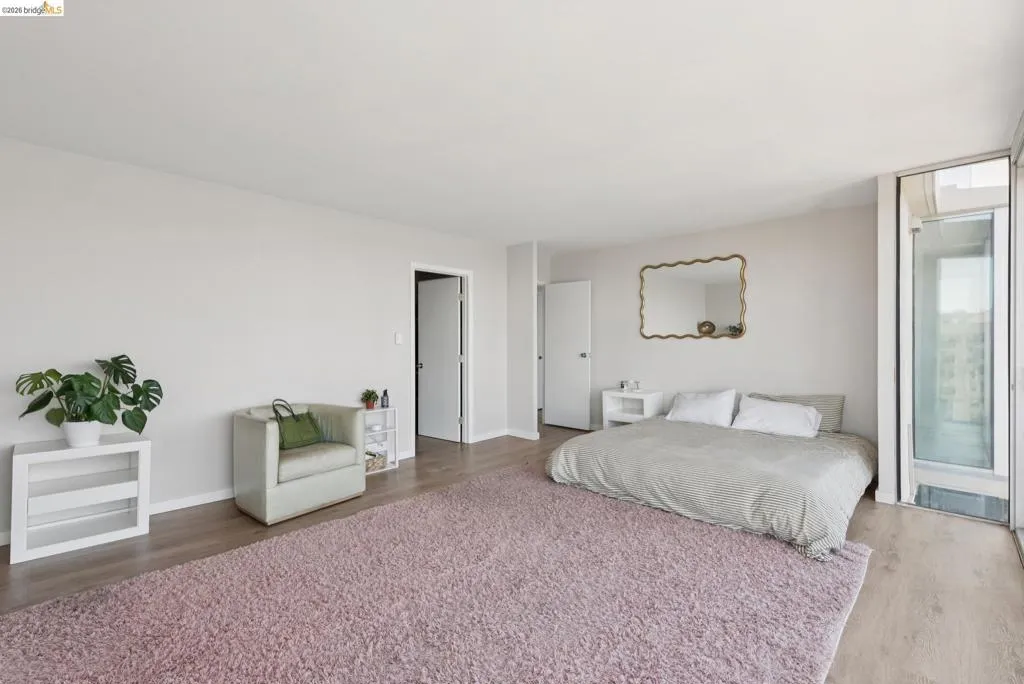Bedroom featuring wood finished floors