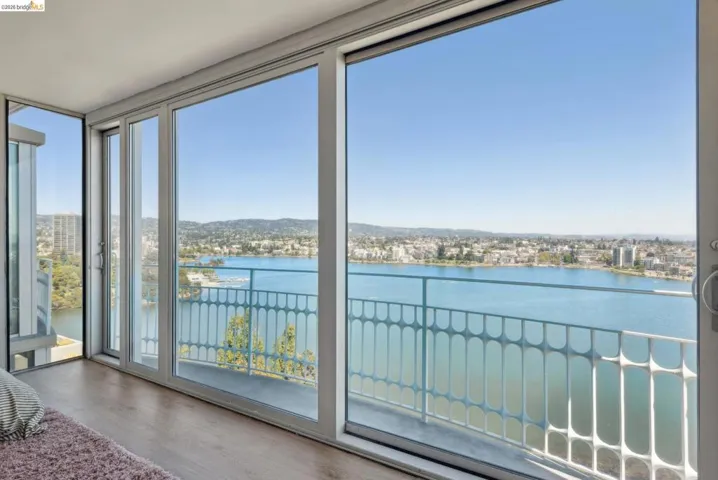 Unfurnished sunroom with a water view