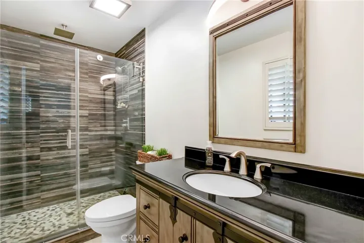 Primary Bathroom with remodeled walk-in shower.