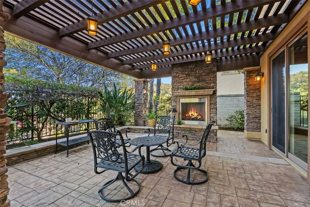 Fire Virtually Added | Covered Patio with Outdoor Fireplace