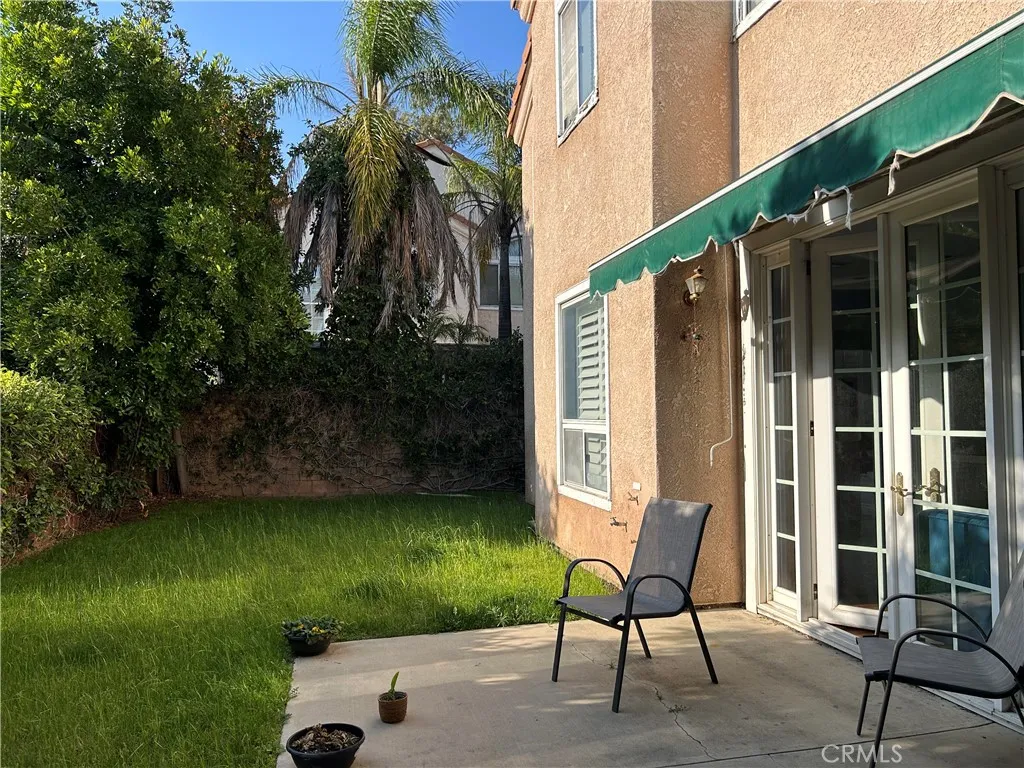 Back Yard Patio with Roll Up Cover