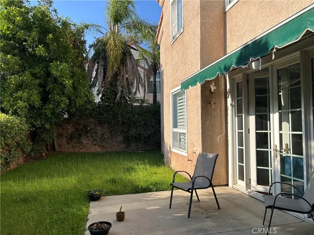 Back Yard Patio with Roll Up Cover