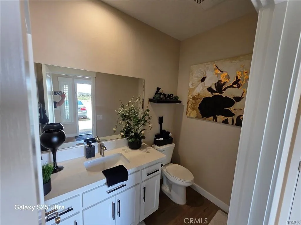 HALF BATHROOM ON THE ENTRANCE