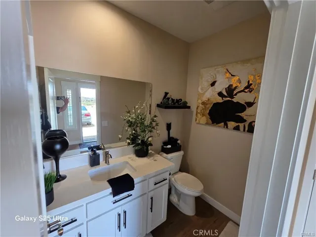HALF BATHROOM ON THE ENTRANCE