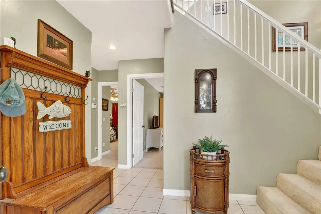 Welcome!  Foyer with doors leading to 2 first level bedrooms