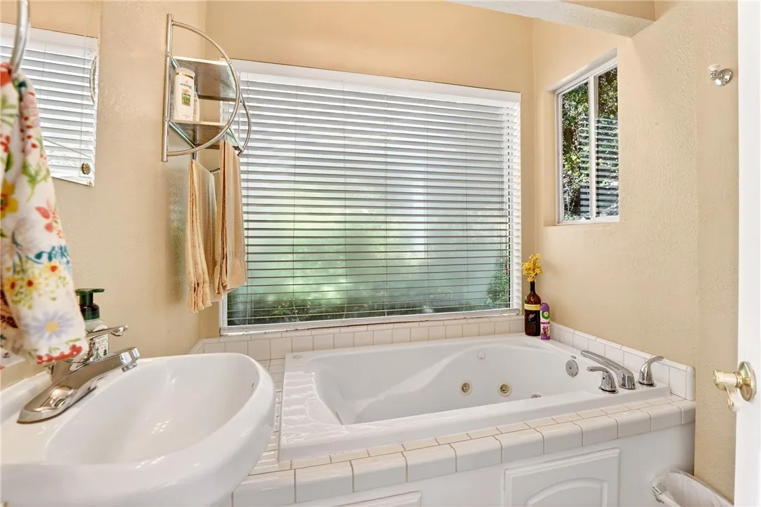 Unwind in the spa-like ADU bathroom with its jetted tub