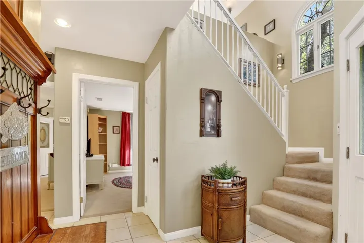 Foyer with stairs up to main level