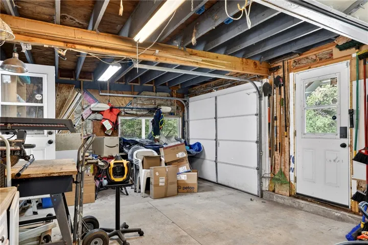 Single car garage for all your toys: bikes, scooters, kayaks, and paddle boards!