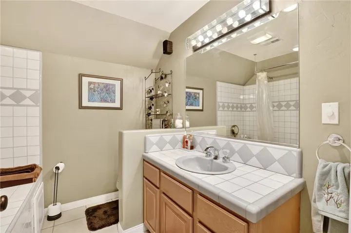First level bathroom with shower and jetted tub