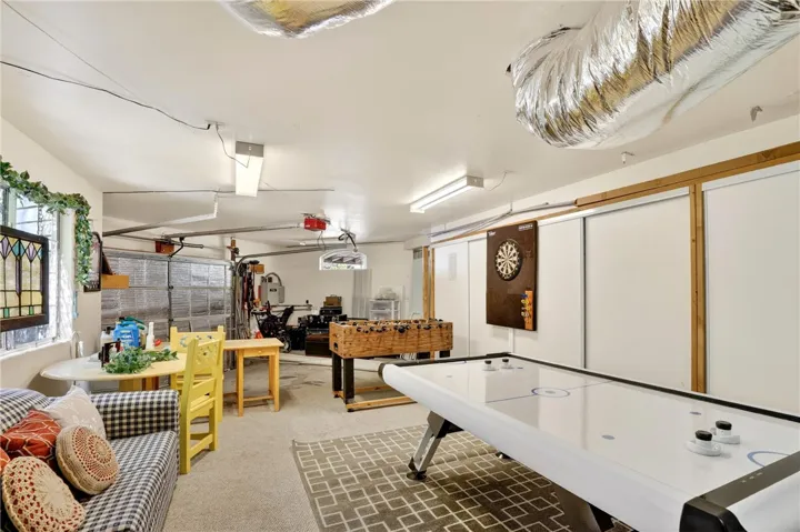 The downstairs game room is the perfect spot for fun and laughter