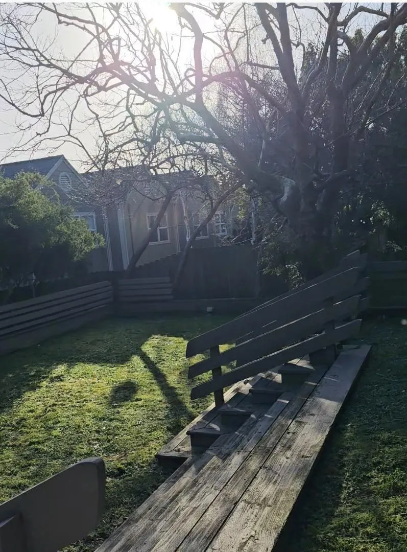 Grassy area on other side of Tot Lot Residents may reserve for private parties.