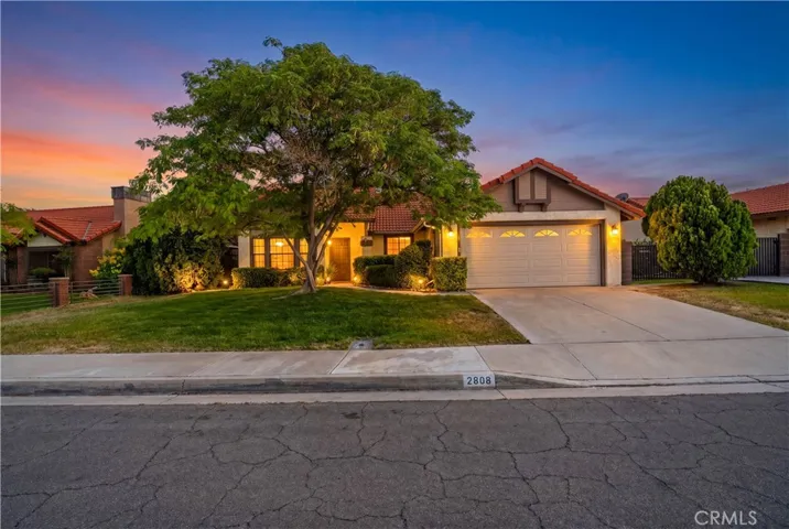 Virtually staged/altered to add twilight setting and indoor/outdoor lighting